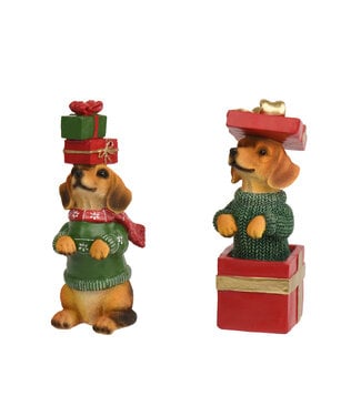 Teckel de Noël avec chandail vert et cadeau