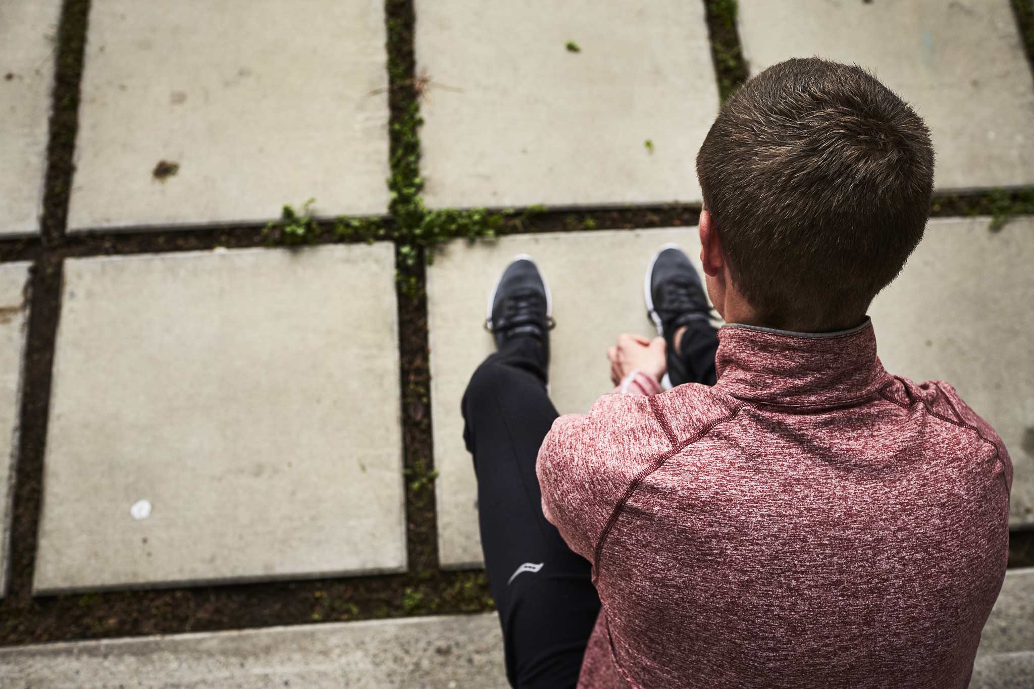 man tying his shoes