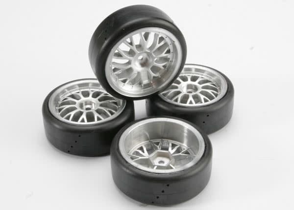 TRA4873 TIRES, PRO-TRAX ON-ROAD (MEDIUM COMPOUND WITH CONTOURED INSERTS) (MOUNTED AND GLUED TO PART #4872 WHEELS) (2 LEFT, 2 RIGHT)