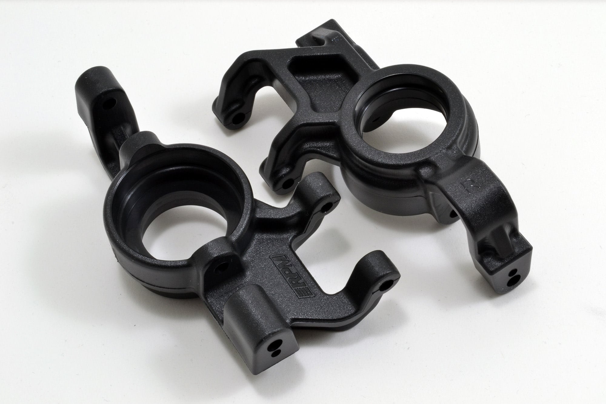 RPM80662 TRAXXAS X-MAXX OVERSIZED FRONT AXLE CARRIERS W/BEARINGS (2)