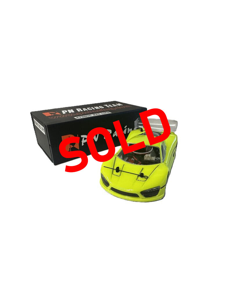 ATOMIC RC ***SOLD*** MTU2506004 PRE-OWNED ATOMIC BZ5 FULLY BUILT W/ LEXAN CONCEPT C9 BODY: FLUORESCENT YELLOW