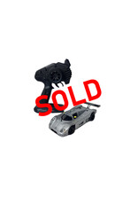 KYOSHO ***SOLD*** MTU2506008 USED KYOSHO MR03 BOX STOCK W/ SAUBER C9 #63 BODY: SILVER
