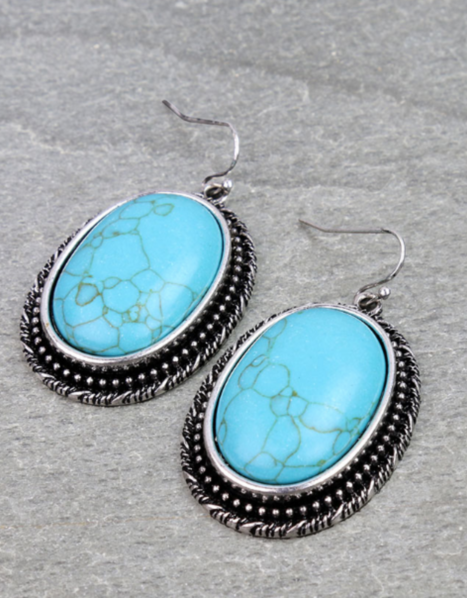 LARGE OVAL TURQUOISE STONES WITH ROPE BOARDER