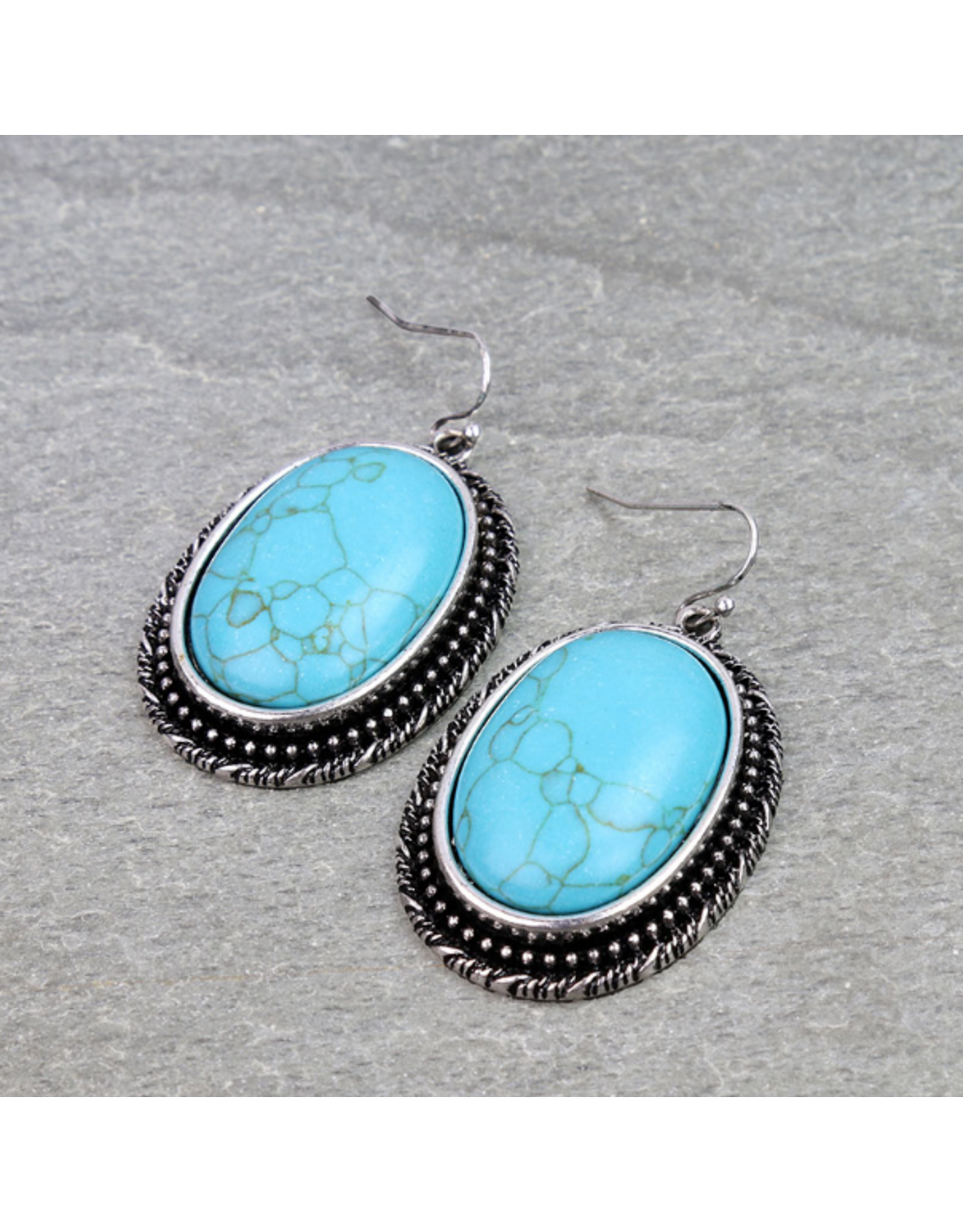 LARGE OVAL TURQUOISE STONES WITH ROPE BOARDER