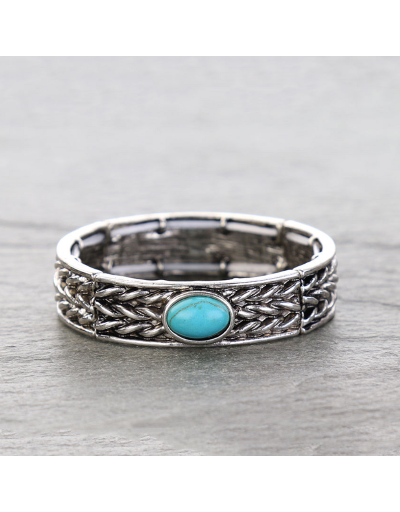 BRACELET TWISTED THREE STRANDS OVAL TURQ STONE