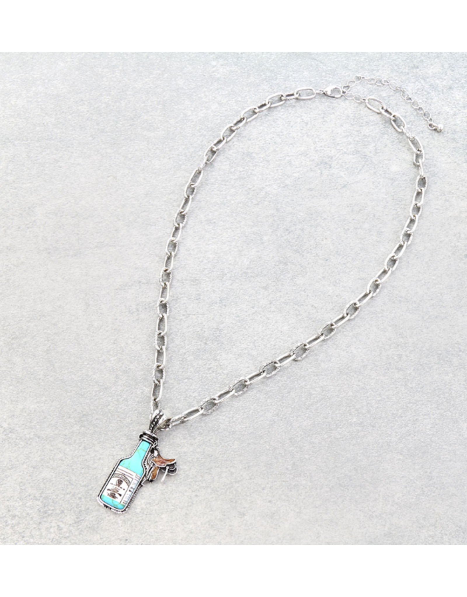 NECKLACE WESTERN WHISKEY BOTTLE AND SADDLE