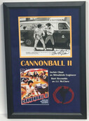 CANNONBALL II ORIGINAL PHOTO FRAMED SIGNED BY BURT REYNOLS AND JACKIE CHAN