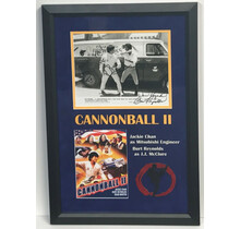 CANNONBALL II ORIGINAL PHOTO FRAMED SIGNED BY BURT REYNOLS AND JACKIE CHAN