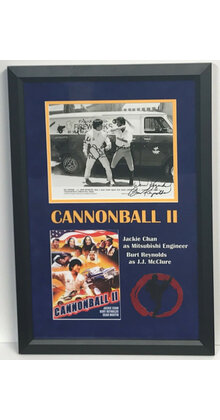 CANNONBALL II ORIGINAL PHOTO FRAMED SIGNED BY BURT REYNOLS AND JACKIE CHAN