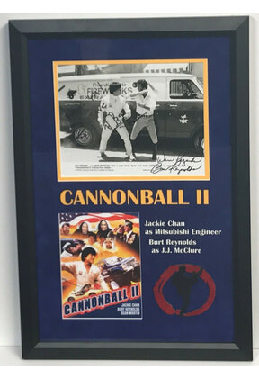 CANNONBALL II ORIGINAL PHOTO FRAMED SIGNED BY BURT REYNOLS AND JACKIE CHAN
