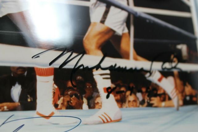 MUHAMMAD ALI  ALI VS FOREMAN SIGNED BY BOTH !! THE ROPE-A-DOPE FIGHT !