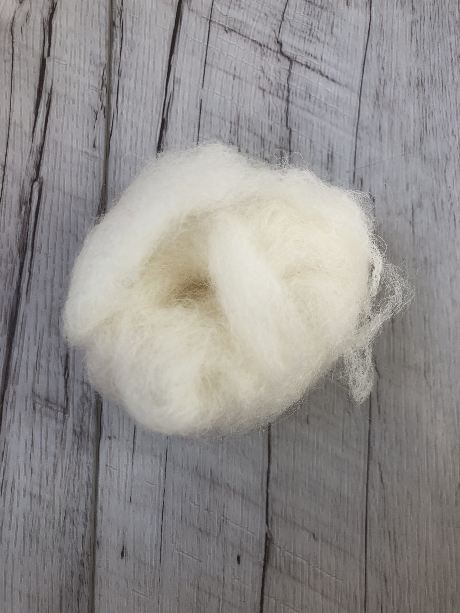 100 raw wool, cleaned and carded /GRAM Spun Fibre Arts, a local and