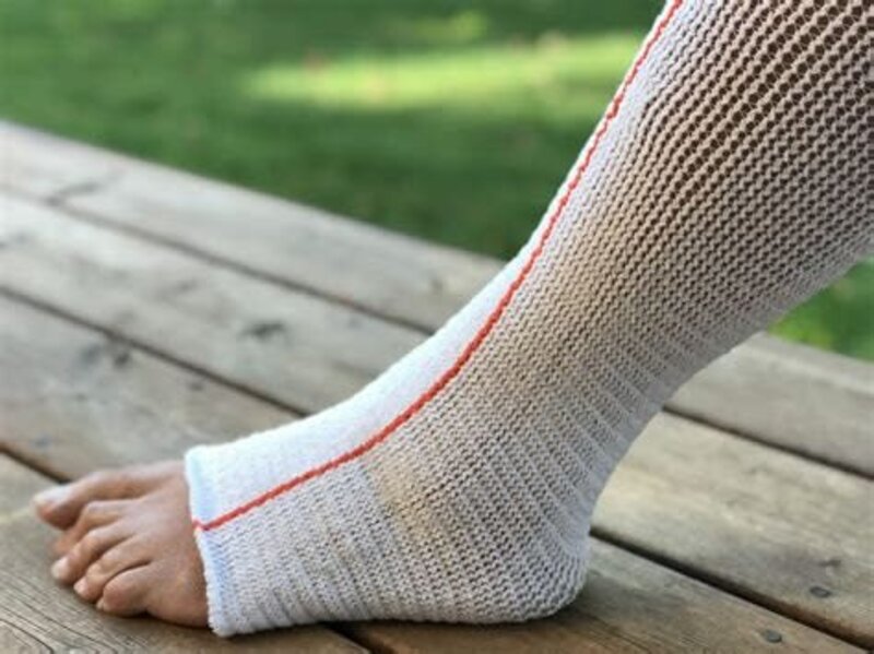 CD-COMPRESSION DYNAMICS Compression Dynamics Edemawear Lite Lymphedema Stockinet Medium, Max Limb Circumference 90cm (24") Length 86cm (34") For Tender Skin, Orange Stripe, Longitudinal Compression, Latex-Free