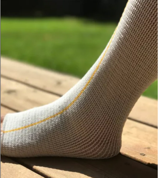 CD-COMPRESSION DYNAMICS Compression Dynamics Edemawear Lymphedema Stockinet Medium Max Limb Circumference 75cm (30") Length 86cm (34") Foot To Groin Or Wrist To Shoulder, Yellow Stripe, Longitudinal Compression, Latex-Free