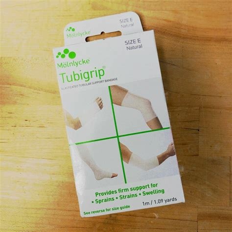 MOL-Molnlycke Molnlycke Tubigrip Tubular Bandage Size E 8.7-9.2cm Roll 1 Meter