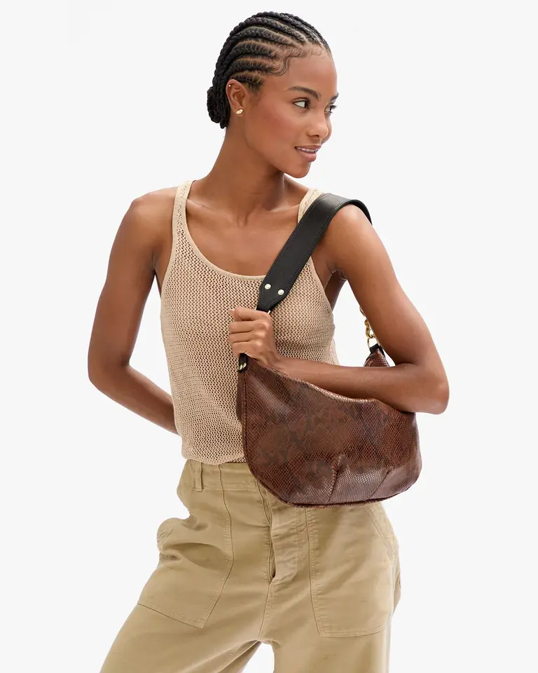 Clare V. Moyen Messenger Pierre Python