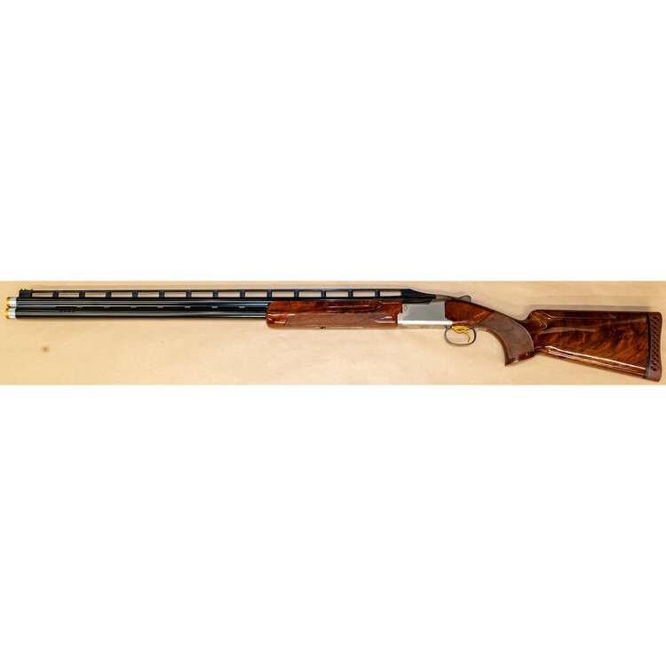 BROWNING 725 TRAP LEFT HAND  O/U 12GA  2.75 " 32" PORTED BARRELS ADJ/COMB