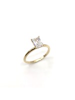 PARÉ Bague solitaire rectangle «radiant» en Or 10K