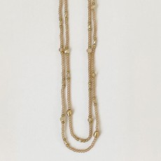 Caracol Long collier avec billes de verre et métal rose
