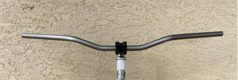 doom Doom: Titanium Lucky Riser,2" Rise, 14d Sweep,Raw finish