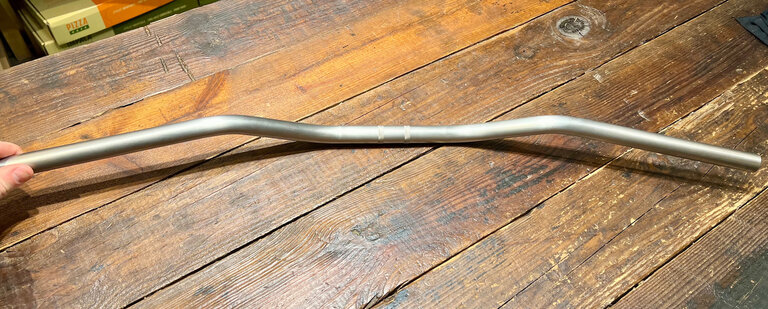 Doom Bars Doom Bars: Titanium Lucky Riser, 2" Rise, 14° Sweep, Raw finish