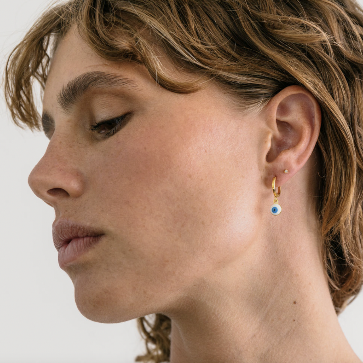 Evil eye deals huggie earrings