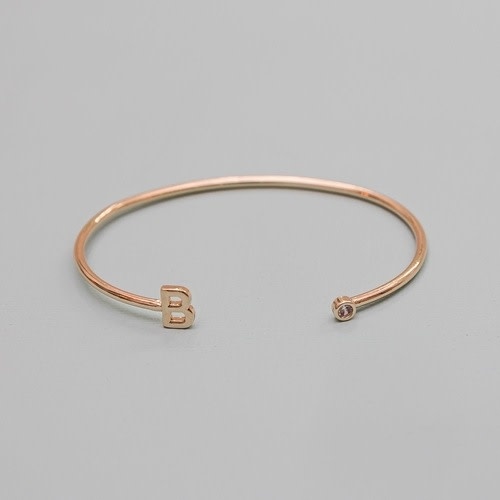 https://cdn.shoplightspeed.com/shops/620628/files/43687660/michelle-mcdowell-mcdowell-initial-cuff-bracelet.jpg