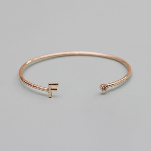 https://cdn.shoplightspeed.com/shops/620628/files/43687684/michelle-mcdowell-mcdowell-initial-cuff-bracelet.jpg