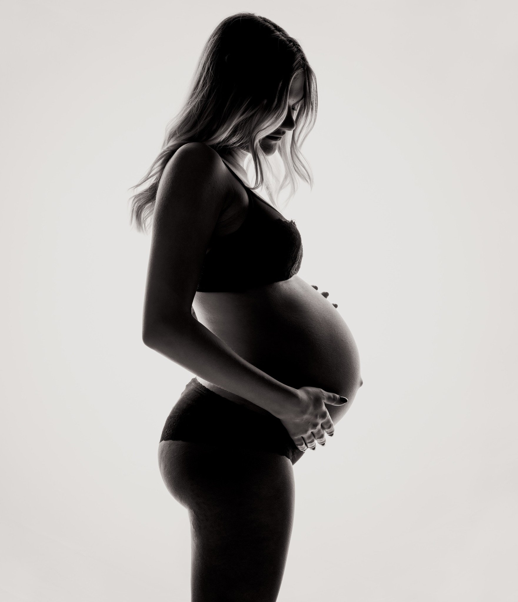 pregnant woman in profile