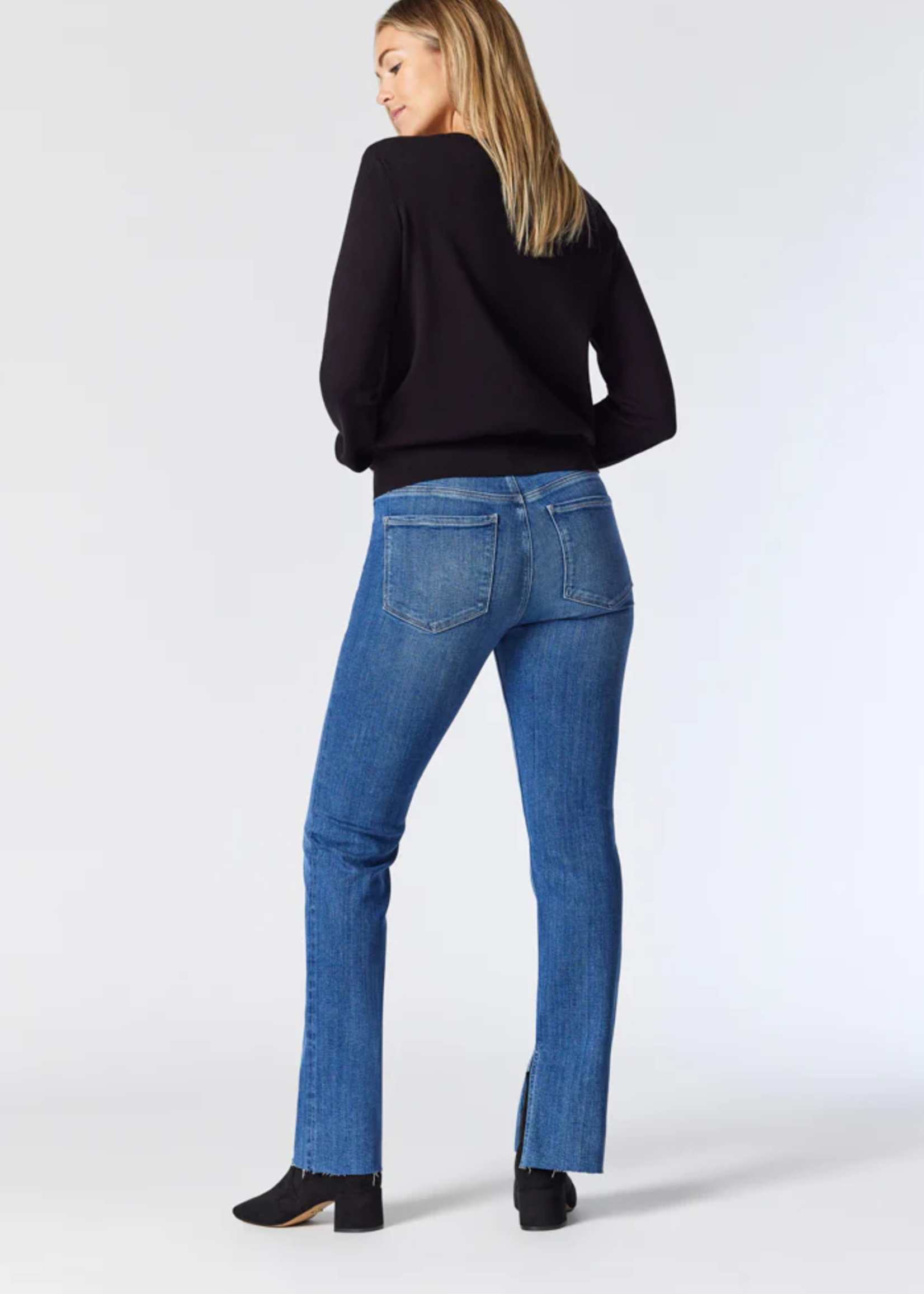 Flared jeans with slit hem