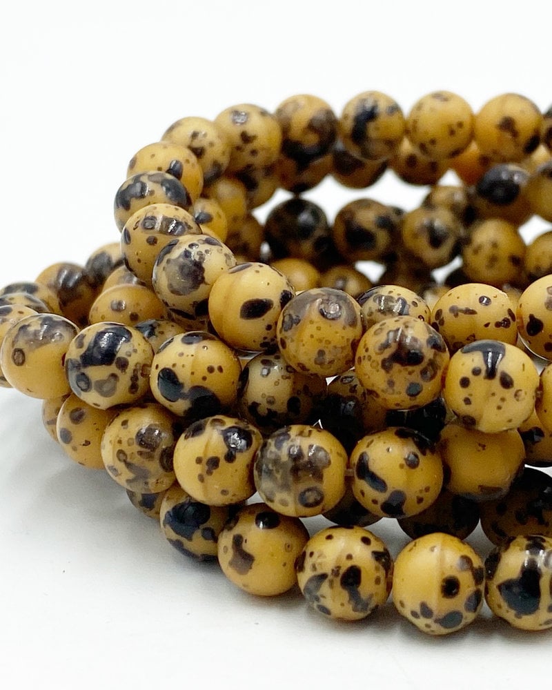 6mm Round Druk Butterscotch with Speckled Black Finish