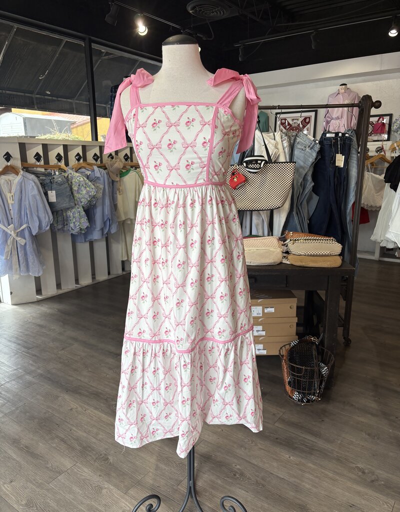 Sundress with pink bow details
