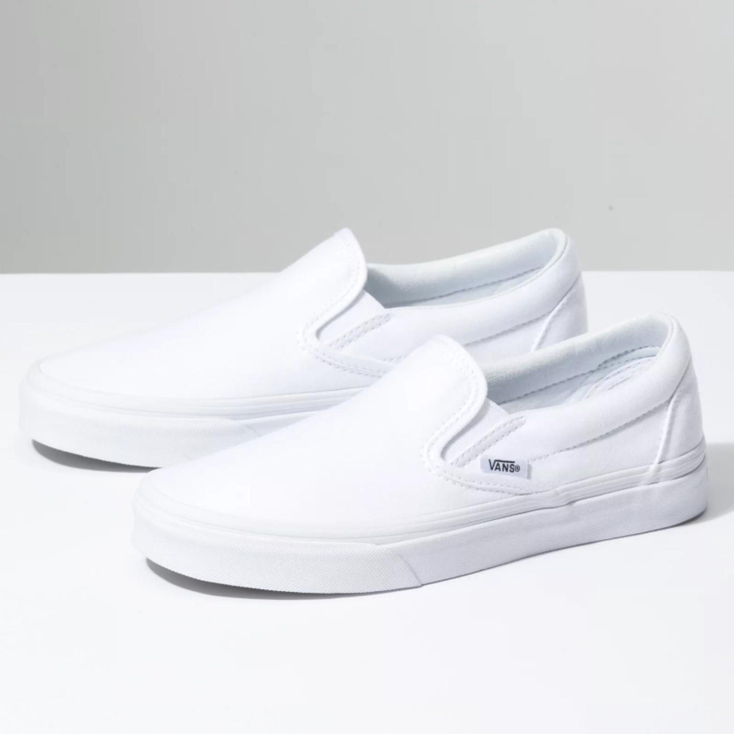 solid white high top vans