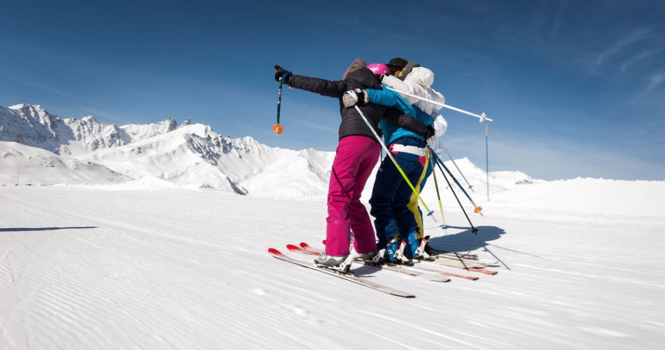 Women skiing together