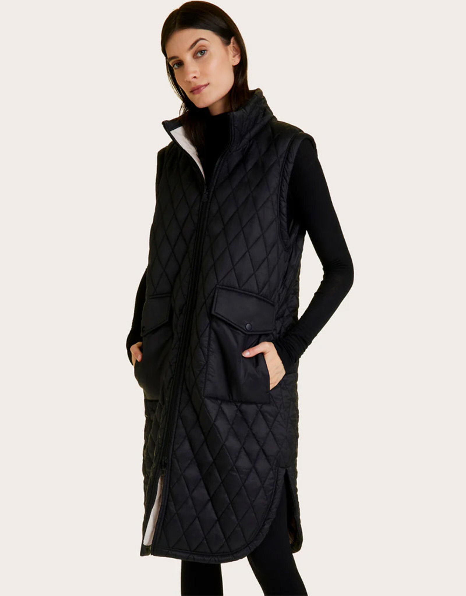 ALALA REVERSIBLE PUFFER VEST
