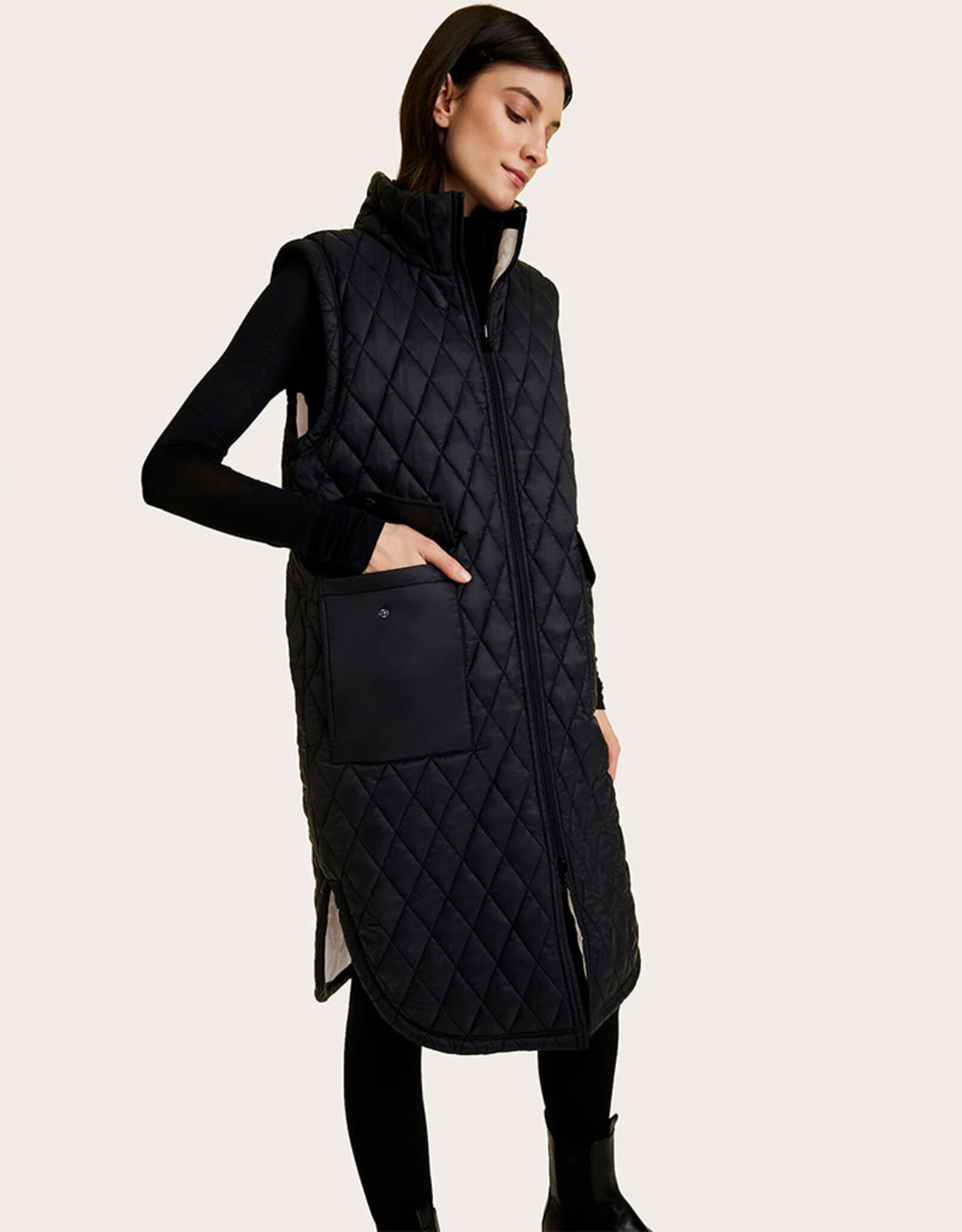 ALALA REVERSIBLE PUFFER VEST