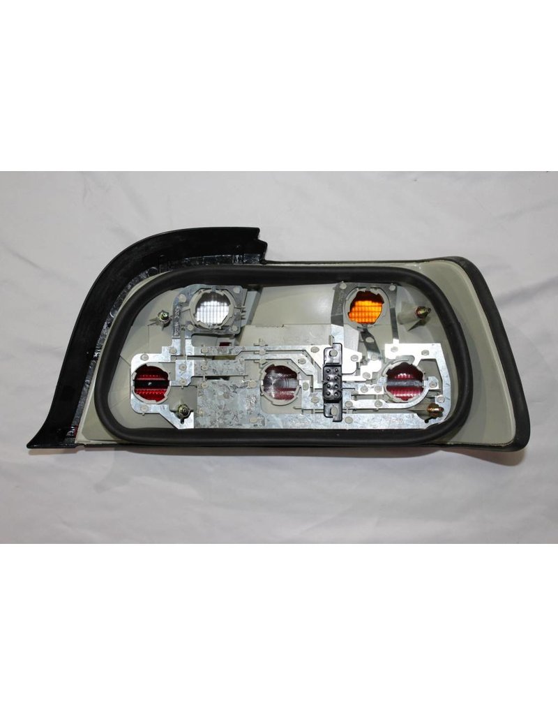 OEM Left side tail light for BMW series 3 E-36 318 and 318is.