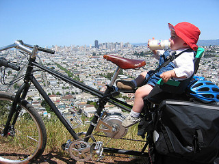 A child on an Xtracycle cargo bike