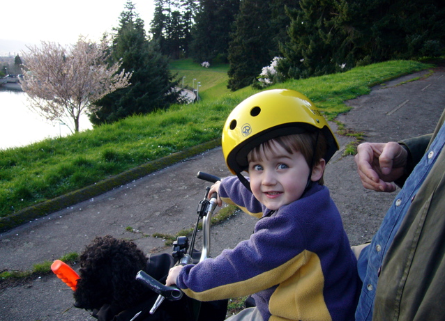 Kid, dog and dad on Brompton