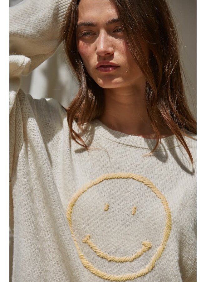 PLAYFUL SMILEY SWEATER