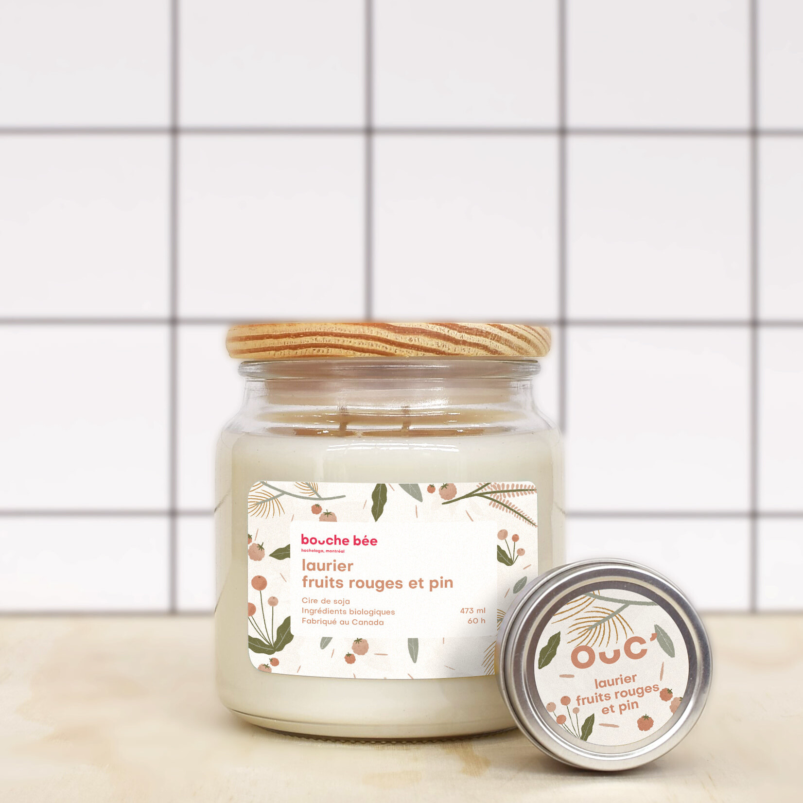Laurel, red berries and pine candle