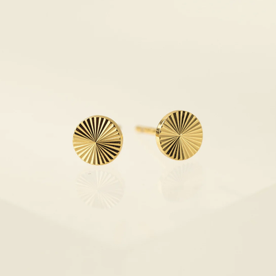 Flat round gold earrings