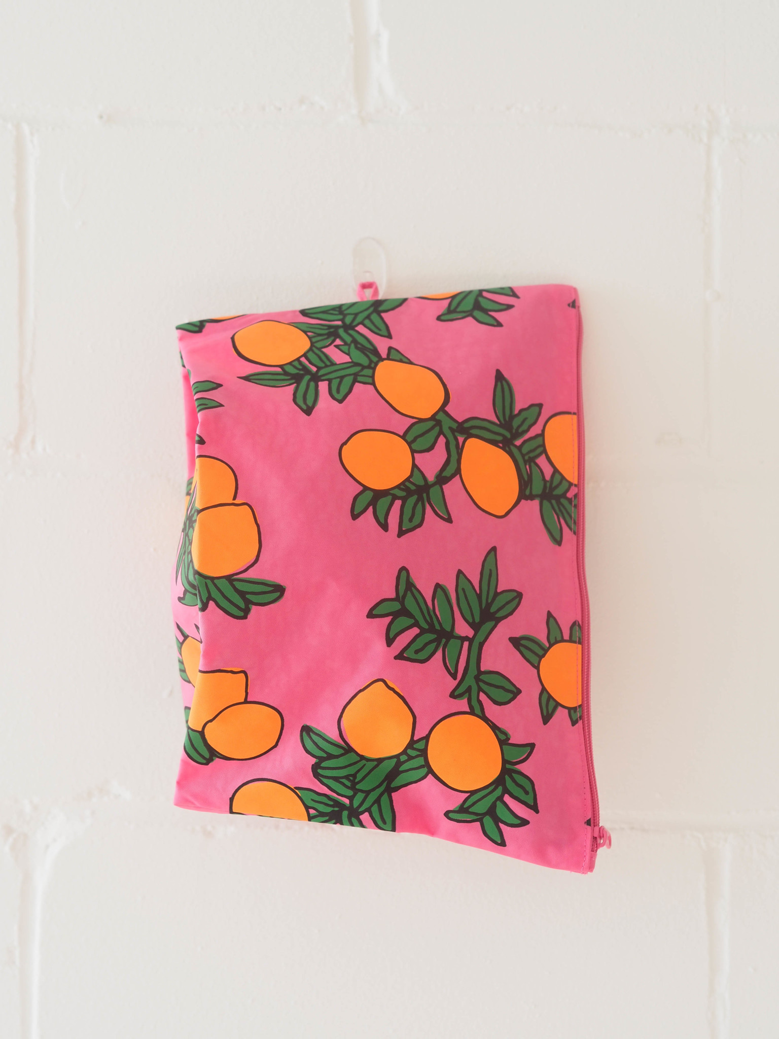 Go Orange Trees clutch bag