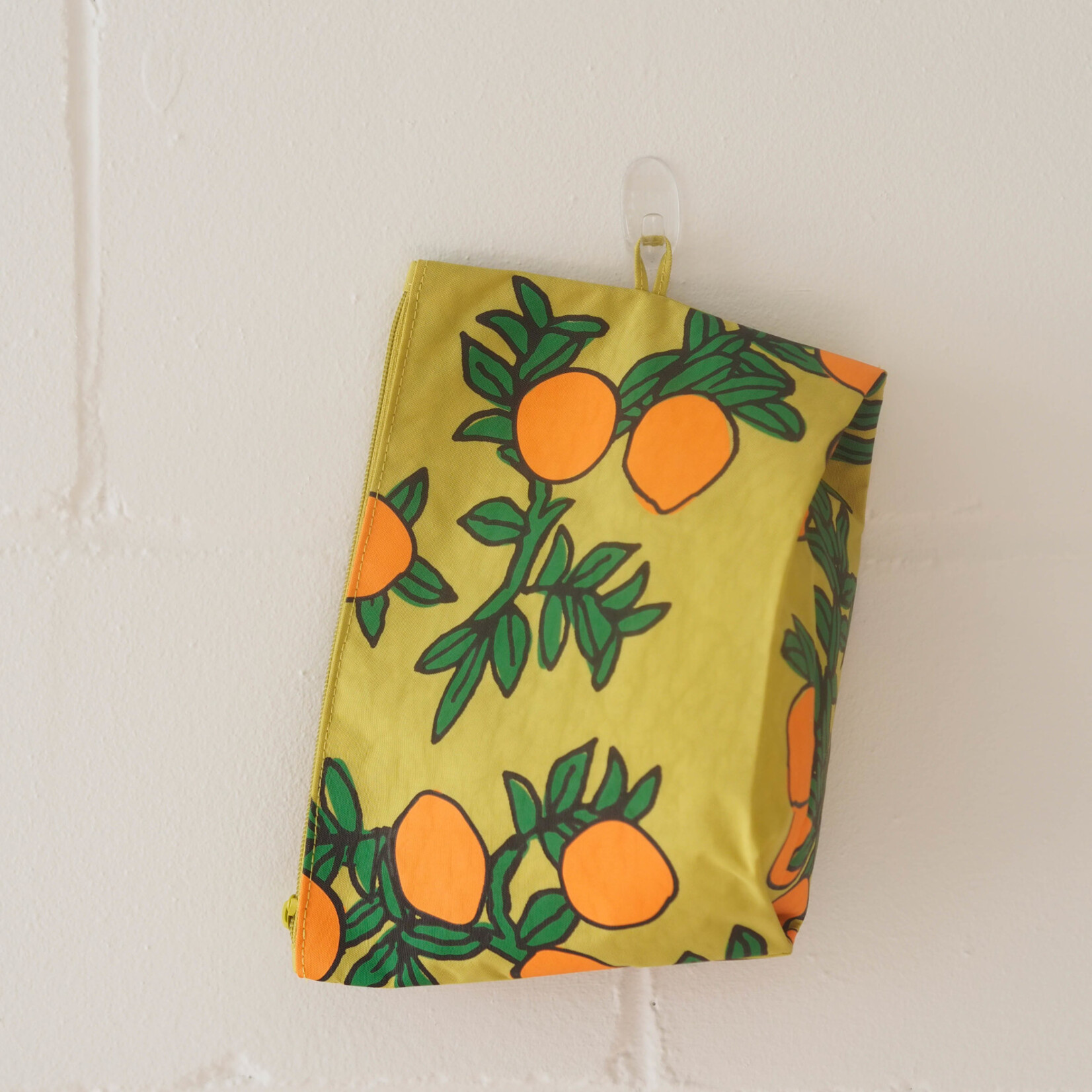 Go Orange Trees clutch bag