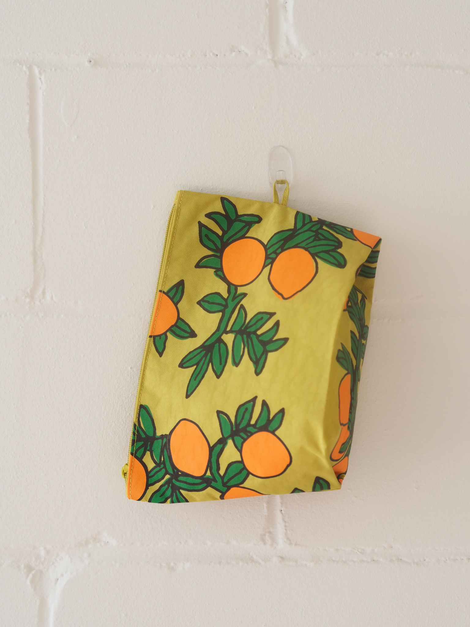 Go Orange Trees clutch bag