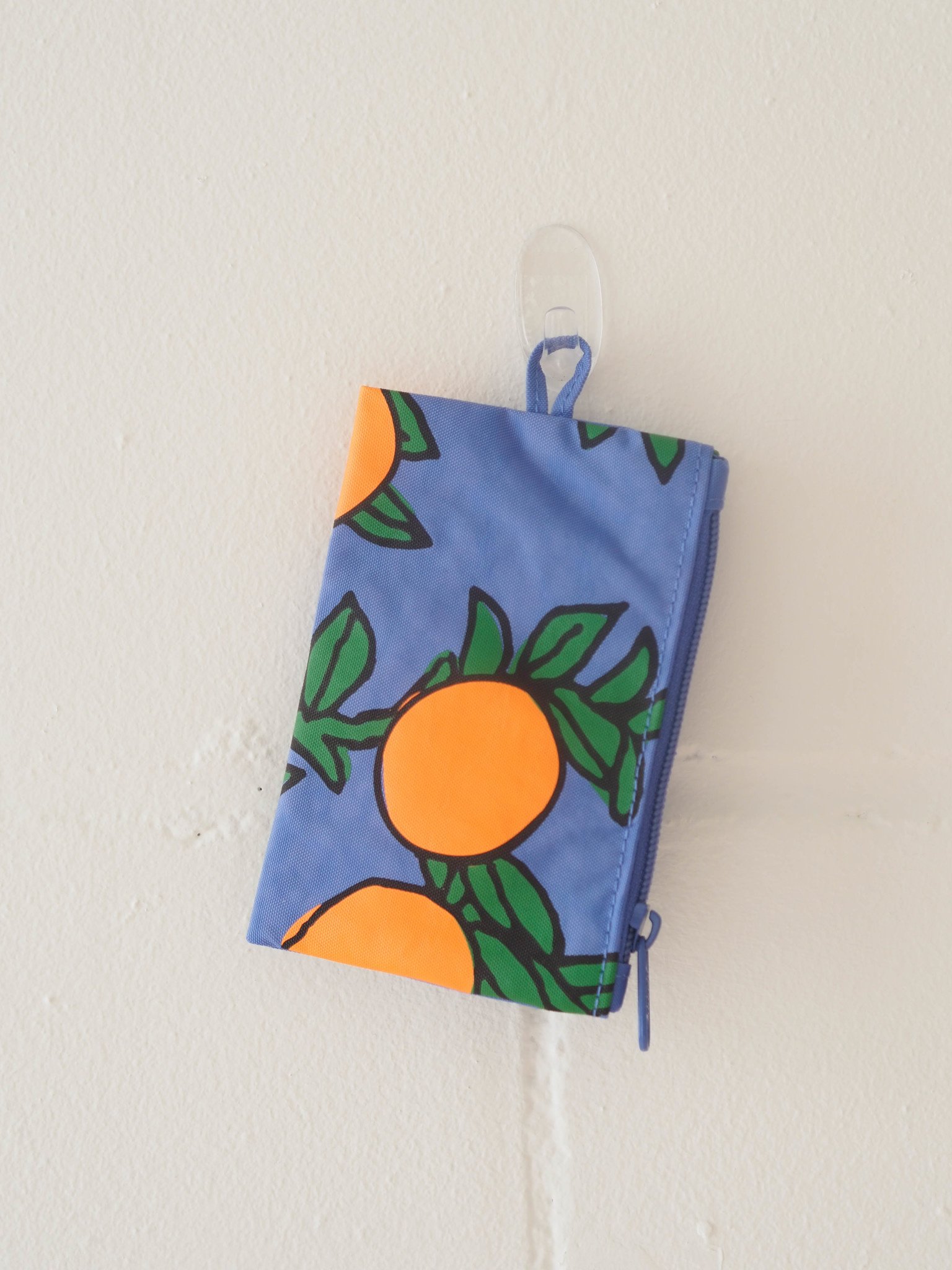 Go Orange Trees clutch bag