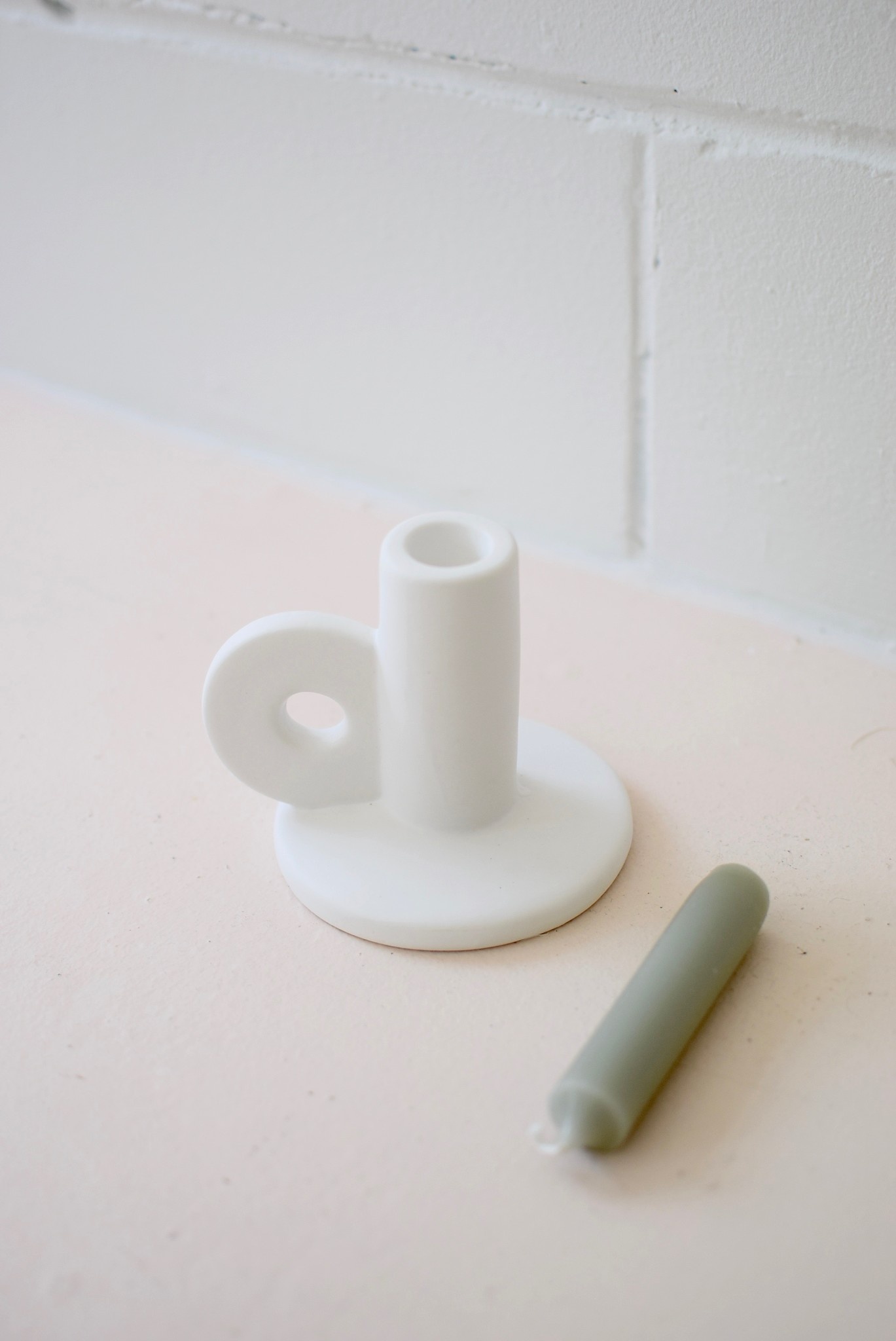 White handle candlestick
