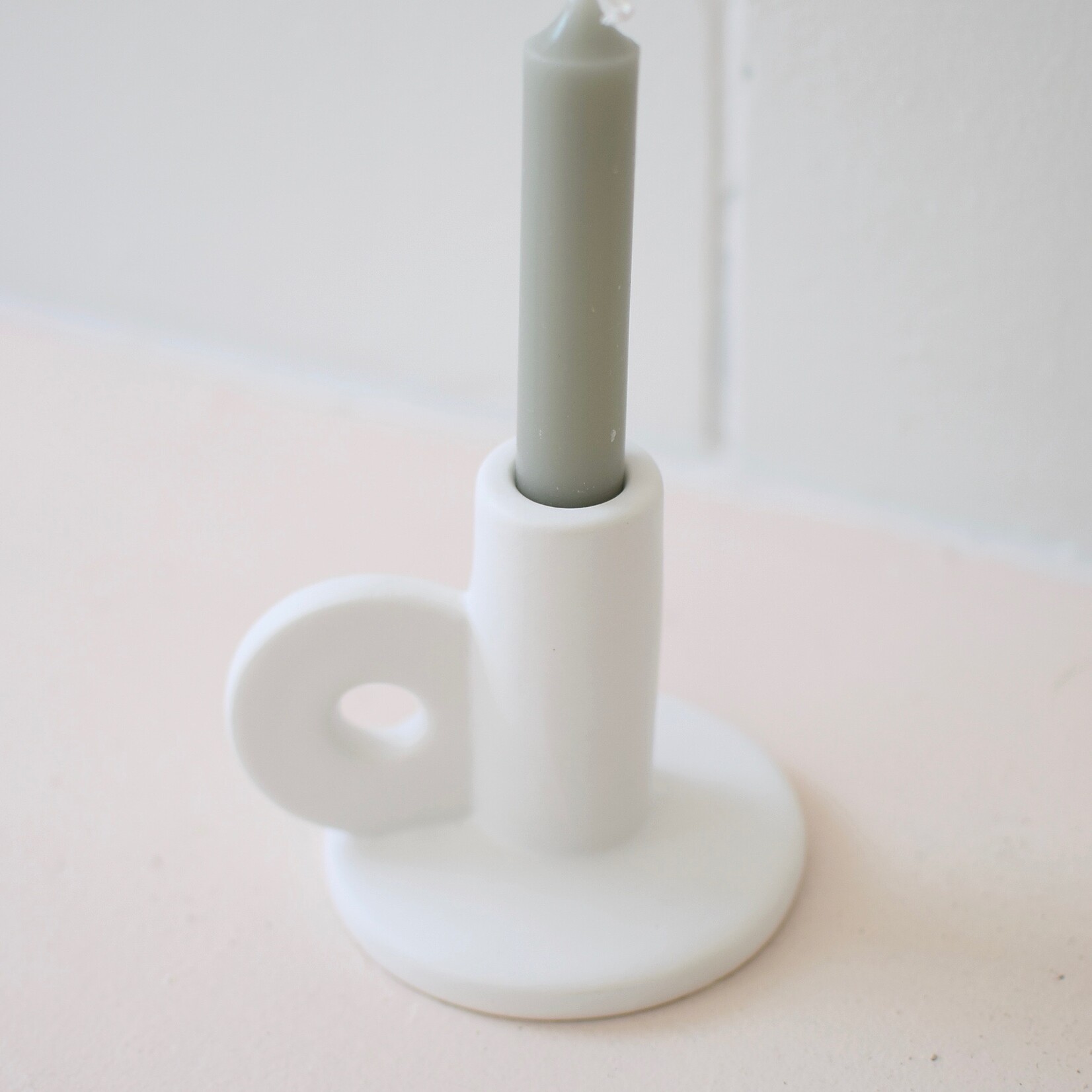 White handle candlestick