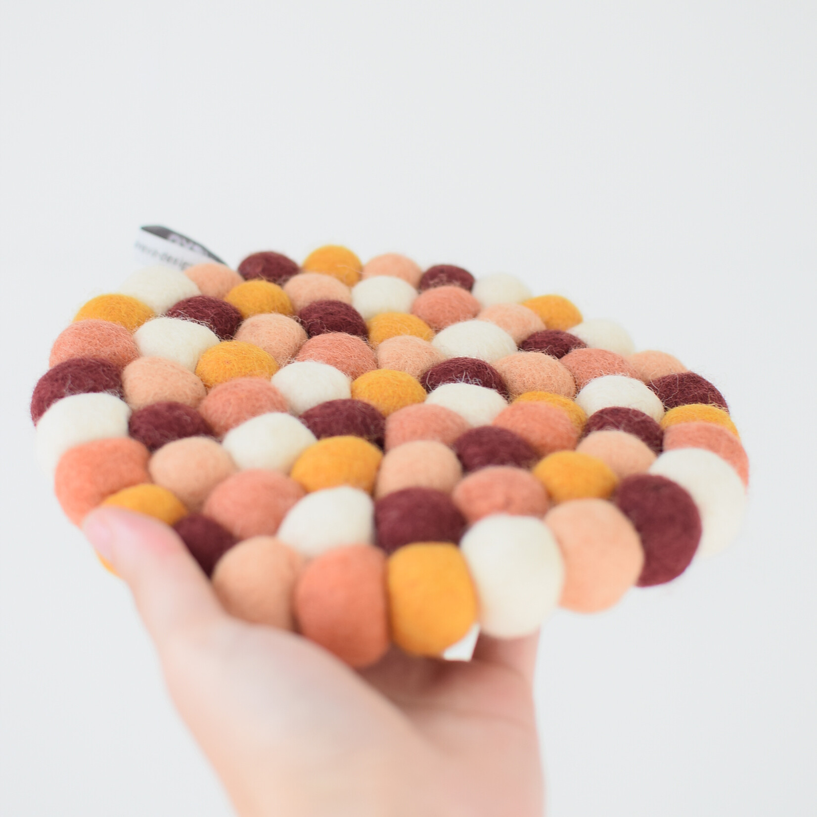 Dessous de plat pompons orange