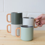 Double-walled mug with wooden handle